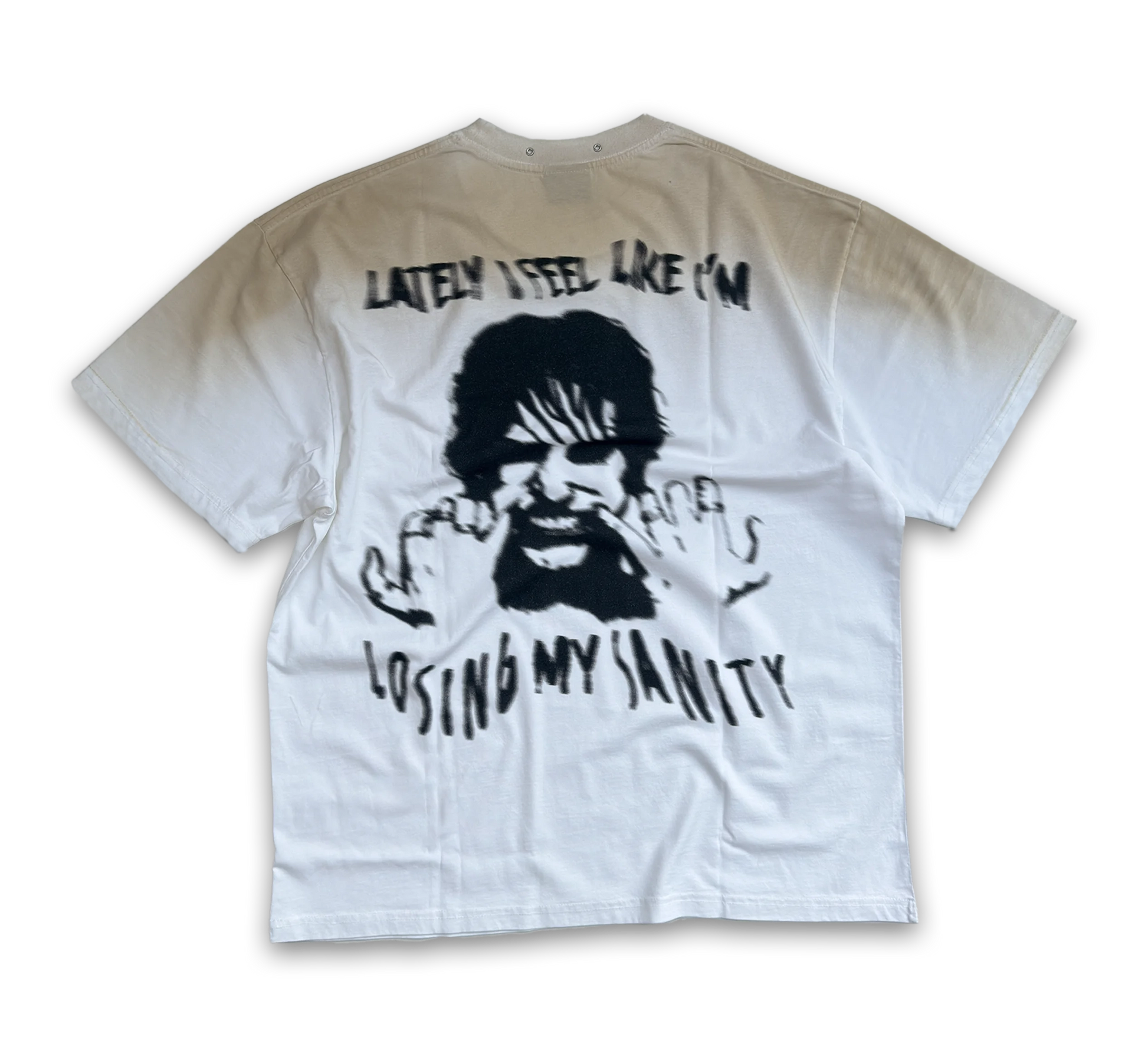 UUNDO Lunatic tee back beige and white t-shirt with graphic design and text 